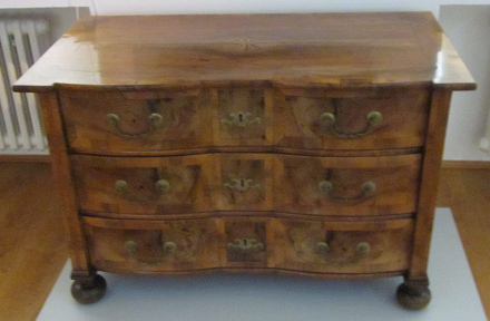 Chest of drawers is invented in
              the 18th century only and is a new type of furniture in
              upper class house holds